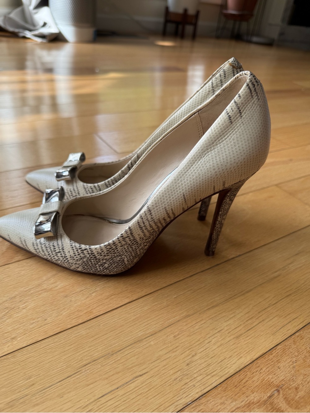 Coach Hallie Snakeskin-Print Pointed Toe Heels with Silver Bow